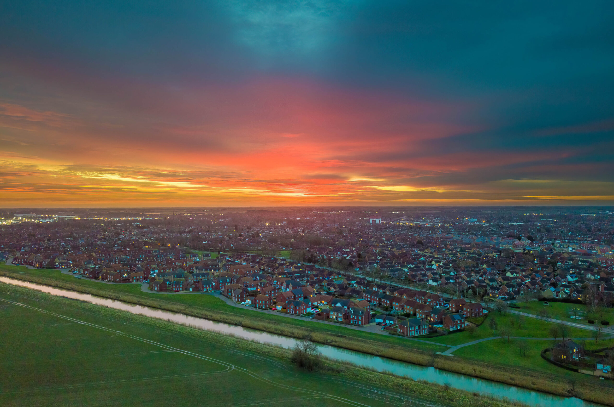 Spalding Lincolnshire, Aerial sunrise Aerial drone view of a winter sunrise over Spalding, Lincolnshire with views of Wygate Park, Vernatt's Drain, Pennygate and the Chatterton Water Tower